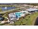 Aerial view of a community pool and recreation center at 12538 Somatic Ct, Venice, FL 34293
