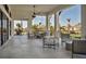Spacious patio area with comfortable seating perfect for relaxation, socializing, and outdoor activities at 12538 Somatic Ct, Venice, FL 34293