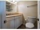 Bright bathroom with vanity, granite counters, and modern fixtures, offering a clean and functional space at 1255 Tarpon Center Dr # 604, Venice, FL 34285