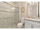 Bathroom featuring a glass shower, granite vanity, and tiled floors at 13829 Alafaya St, Venice, FL 34293