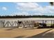 Scenic lake view with a fishing dock and a variety of recreational opportunities at 13829 Alafaya St, Venice, FL 34293