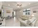 Bright living room with tile floors, neutral paint, and ample natural light at 13829 Alafaya St, Venice, FL 34293