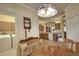 Cozy dining area with a view of the kitchen and laundry area at 1438 Maseno Dr, Venice, FL 34292