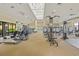 Well-equipped gym with modern machines, fans, and natural light at 1438 Maseno Dr, Venice, FL 34292