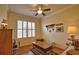 Office room featuring plantation shutters, ceiling fan and hardwood floors at 1438 Maseno Dr, Venice, FL 34292