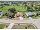 Aerial view of the home in its community, highlighting surrounding streets, golf course, and neighborhoods at 1439 Strada D Argento, Venice, FL 34292
