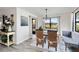 Charming dining area with view of the outdoor space and stylish decor elements at 1439 Strada D Argento, Venice, FL 34292