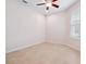 Bright bedroom with tile floors, a ceiling fan, and a window that offers natural light at 1493 Maseno Dr, Venice, FL 34292