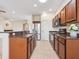 Spacious kitchen with granite countertops, stainless steel appliances, and an open layout at 1493 Maseno Dr, Venice, FL 34292