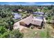 Aerial view of home showcasing pool and spacious outdoor area at 1515 Pecan St, Nokomis, FL 34275