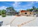 Backyard view with patio, outside dining area, and pool with enclosure at 1515 Pecan St, Nokomis, FL 34275