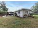 Backyard view featuring a cozy gazebo with outdoor seating, perfect for entertaining at 161 Suntan Ave, Sarasota, FL 34237