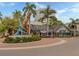 Aesthetic urban sculpture at the Florida Studio Theatre, surrounded by lush greenery and buildings at 161 Suntan Ave, Sarasota, FL 34237