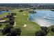 Scenic aerial shot of a golf course community with sparkling lakes, manicured greens, and beautiful homes at 165 Tiziano Way, North Venice, FL 34275