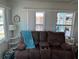 Comfortable living room seating with lots of natural light at 202 Mantua Dr, Venice, FL 34285