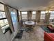 Sunroom with lots of windows and a dinette at 202 Mantua Dr, Venice, FL 34285