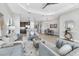Open-concept living area with a dining space and modern kitchen at 21649 Avon Park Ct, Venice, FL 34293