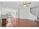 Spacious living room featuring hardwood floors, neutral paint, and a ceiling fan at 233 Cape Harbour Loop # 107, Bradenton, FL 34212