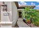 Charming entrance with landscaped walkway, front door, and terracotta roof at 241 Marcheno Way, Nokomis, FL 34275