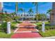 Charming storefronts on a brick walkway create an inviting commercial space for community shopping at 241 Marcheno Way, Nokomis, FL 34275