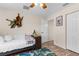 Comfortable bedroom with neutral walls, ceiling fan, and closet for storage at 2424 Affinity Ln, North Port, FL 34286