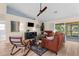 Bright living room with vaulted ceilings, modern furnishings, and an open design at 2424 Affinity Ln, North Port, FL 34286