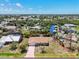 Aerial view showcasing the home's location and waterfront access at 2618 Titania Rd, Englewood, FL 34224