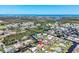 Scenic aerial view featuring waterfront properties, lush greenery, and waterways at 2618 Titania Rd, Englewood, FL 34224
