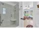 Bathroom with a glass shower and views into the bedroom at 2618 Titania Rd, Englewood, FL 34224