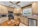 Charming kitchen with stainless steel appliances and a cozy breakfast nook at 2618 Titania Rd, Englewood, FL 34224