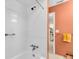 Modern walk-in shower with sleek fixtures and a tiled surround at 2618 Titania Rd, Englewood, FL 34224