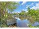 Relaxing waterfront views and lush mangrove trees at 2618 Titania Rd, Englewood, FL 34224