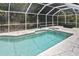 Enclosed pool area with a swimming pool, hot tub, and ample deck space, great for outdoor enjoyment at 27416 Natal Dr, Punta Gorda, FL 33983