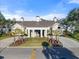 Elegant clubhouse with manicured landscaping and a welcoming entrance, creating a strong first impression at 27467 Janzen Ct, Englewood, FL 34223