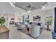 Cozy living room with comfortable seating, stylish decor, and an open layout, perfect for relaxation at 27467 Janzen Ct, Englewood, FL 34223