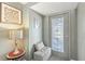 Inviting foyer with decorative accents and a stylish lamp at 318 Venice East Blvd, Venice, FL 34293