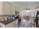 Well-equipped kitchen with modern appliances and ample countertop space at 318 Venice East Blvd, Venice, FL 34293