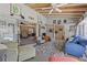 Bright living room with vaulted ceilings and access to other living spaces and pool at 318 Venice East Blvd, Venice, FL 34293