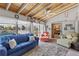 Bright living room with vaulted ceilings and access to the screened-in pool area at 318 Venice East Blvd, Venice, FL 34293