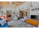 Bright living room with vaulted ceilings and access to other living spaces at 318 Venice East Blvd, Venice, FL 34293