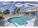 Enjoy the Florida sunshine in this screened-in pool with ample deck space and views of the yard at 318 Venice East Blvd, Venice, FL 34293