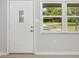 Home entryway with neutral decor and natural light at 3181 Alta Vista St, Sarasota, FL 34237