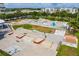 Aerial shot of a skatepark showcasing various ramps, bowls, and graffiti art, offering a dynamic space for skateboarding at 3181 Alta Vista St, Sarasota, FL 34237