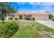 Charming single-story home with a well-manicured lawn and inviting curb appeal at 3851 Sterling Rd, Venice, FL 34293