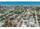 Aerial view of a neighborhood close to the beach; property is outlined in red for clarity at 409 Armada S Rd, Venice, FL 34285