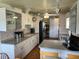 Bright kitchen featuring sleek countertops and plentiful cabinet space at 417 Via Veneto, Venice, FL 34285