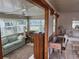 Bright living room with a comfortable sofa, offering a relaxing and airy atmosphere at 417 Via Veneto, Venice, FL 34285