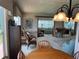 Cozy living room with stylish decor and a view into another room at 417 Via Veneto, Venice, FL 34285