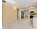 Spacious kitchen and dining area features modern stainless steel appliances and ample white cabinetry at 4270 Ascot Dr, North Port, FL 34291