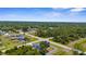 Desirable community featuring a single-Gathering home with lush landscaping and community views at 4305 Heyward St, North Port, FL 34291